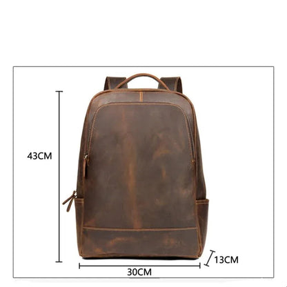 Vintage brown leather backpack shown with overall dimensions diagram