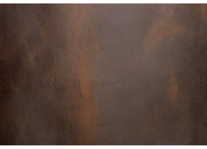 Vintage leather backpack panel detail with distressed brown finish