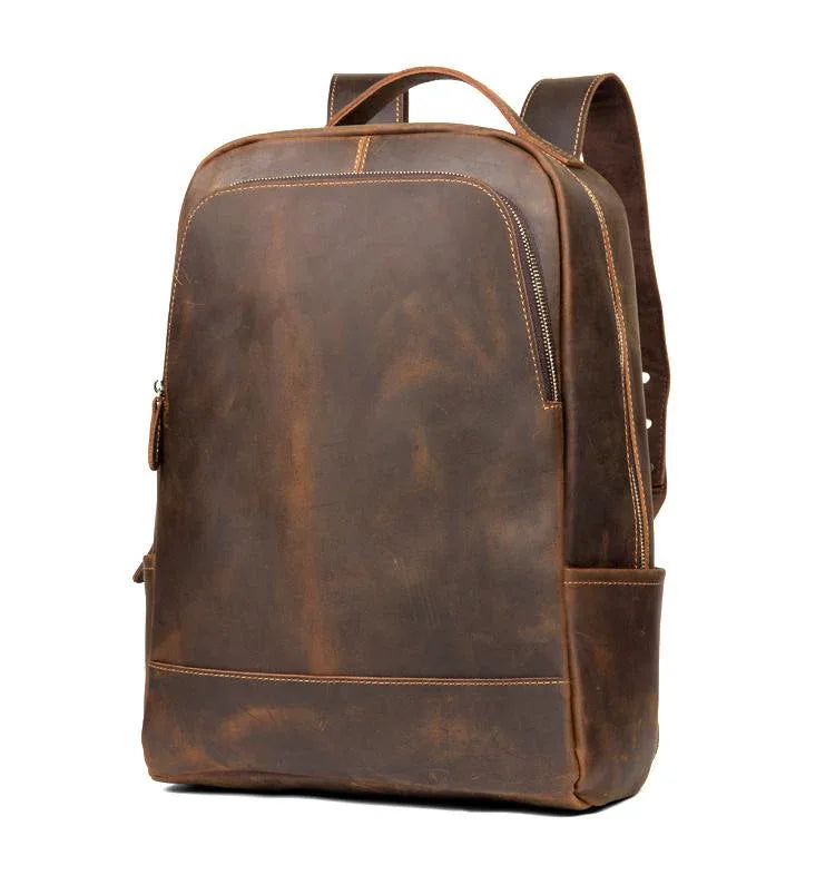 Vintage leather backpack with side zipper and adjustable shoulder straps in dark brown