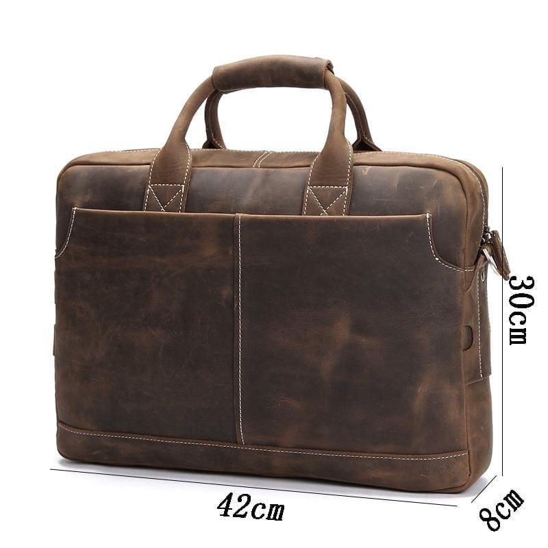 Vintage leather messenger bag in dark brown with front panel stitching and side zipper pocket