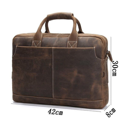 Vintage leather messenger bag in dark brown with front panel stitching and side zipper pocket