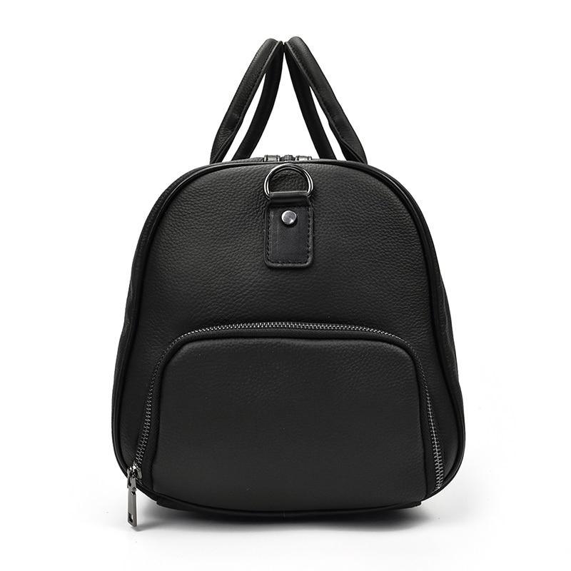 Black vintage leather weekender duffle bag with top handles and front zip pocket