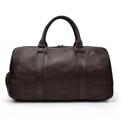 Brown leather weekender duffle bag with top handles and center panel seams.