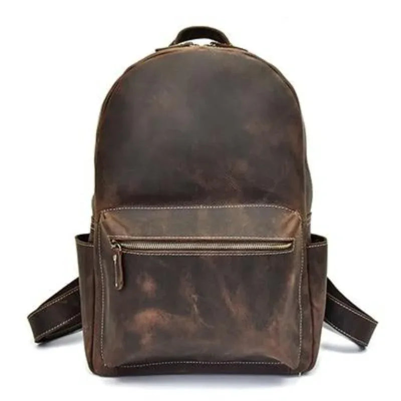 Brown leather backpack on a white background