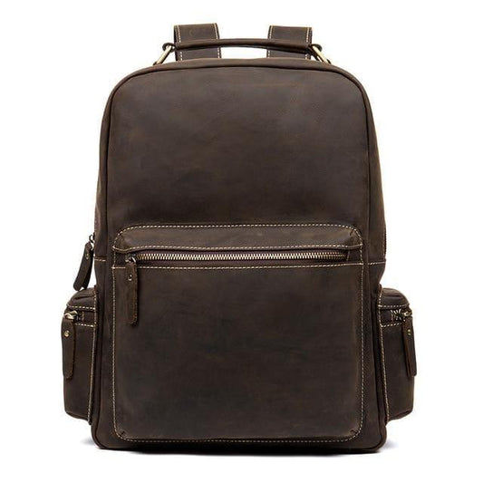 Dark brown vintage leather backpack with top handle, front zip pocket, and adjustable straps.