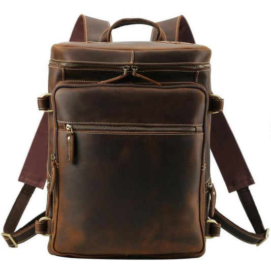 Vintage cow leather backpack, front zip pocket and top handle, brown with tan stitching