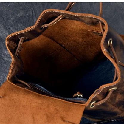 Leather rucksack interior view with suede lining and metal grommet details