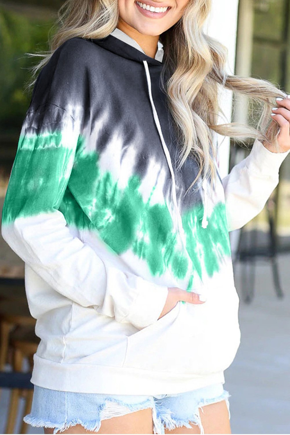 Picture of a Radiant Sunset Tie-Dye Hoodie in back and green front view