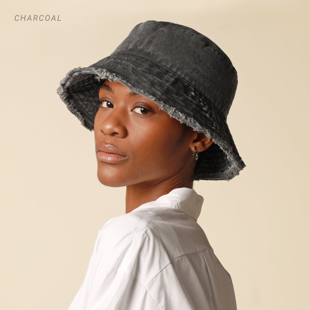 Model wearing the Plain Frayed Bucket Hat in charcoal