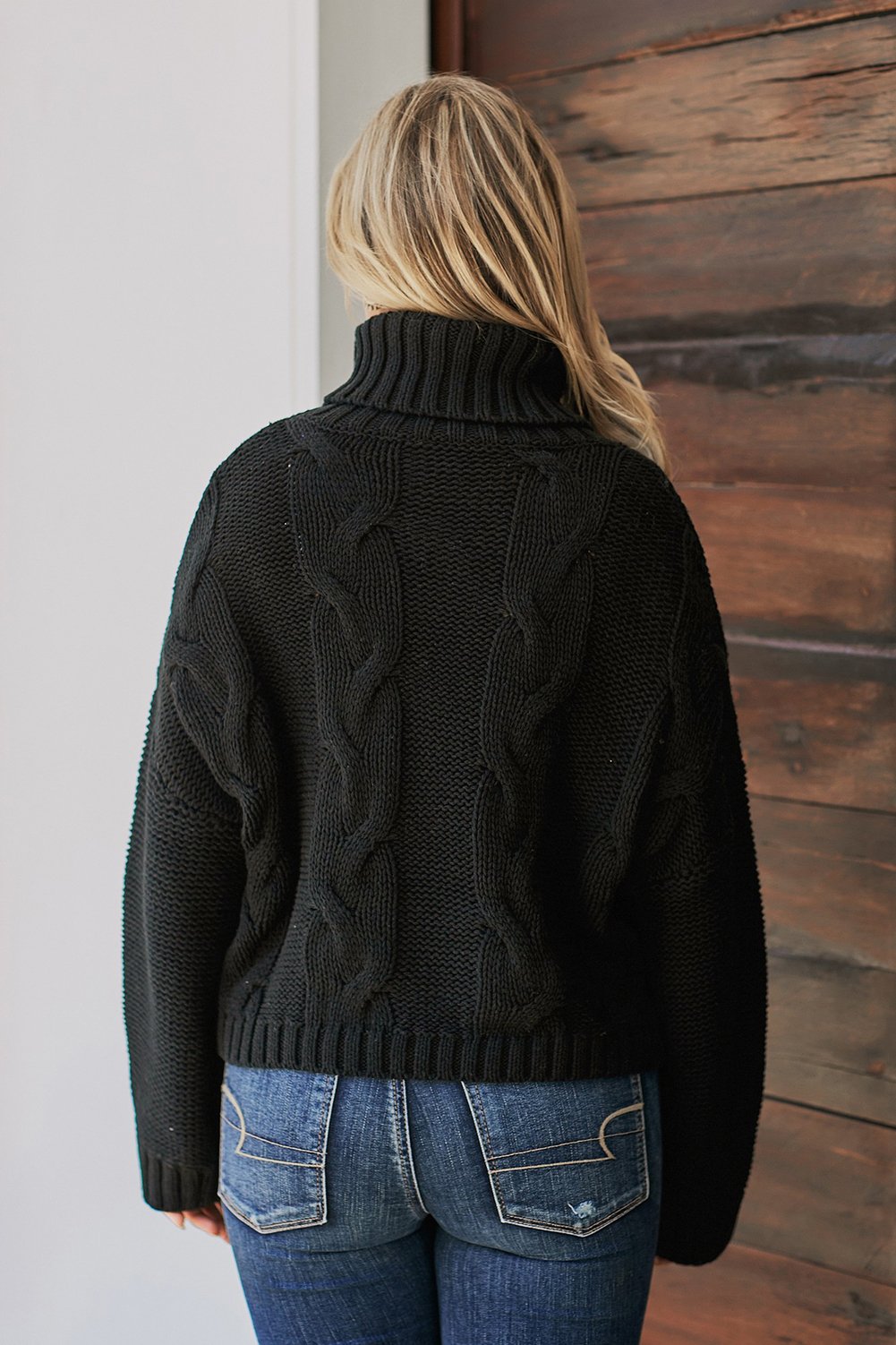 Picture of a Women's Cuddle Approved Cable Knit Handmade Turtleneck Sweater black back