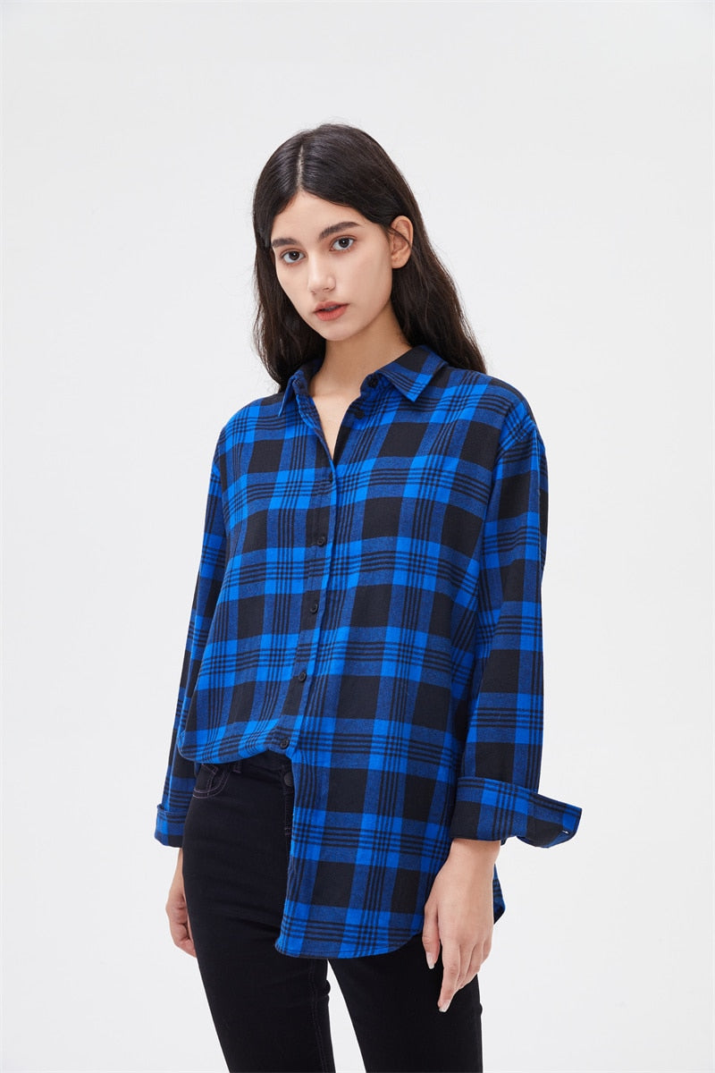 Women's Button Up Cotton Flannel Shirt model shot blue version of shirt buttoned and half tucked