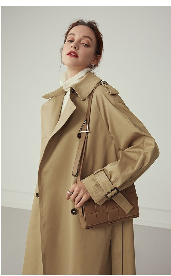 Women's Long Cotton Khaki Trench Coat action shot side view with purse