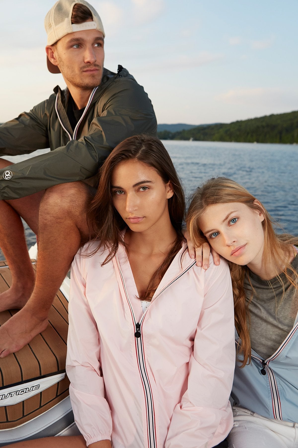 Picture of a Women's Ballet Slipper Full Zip Pink Waterproof Rain Jacket on the lake front view with models