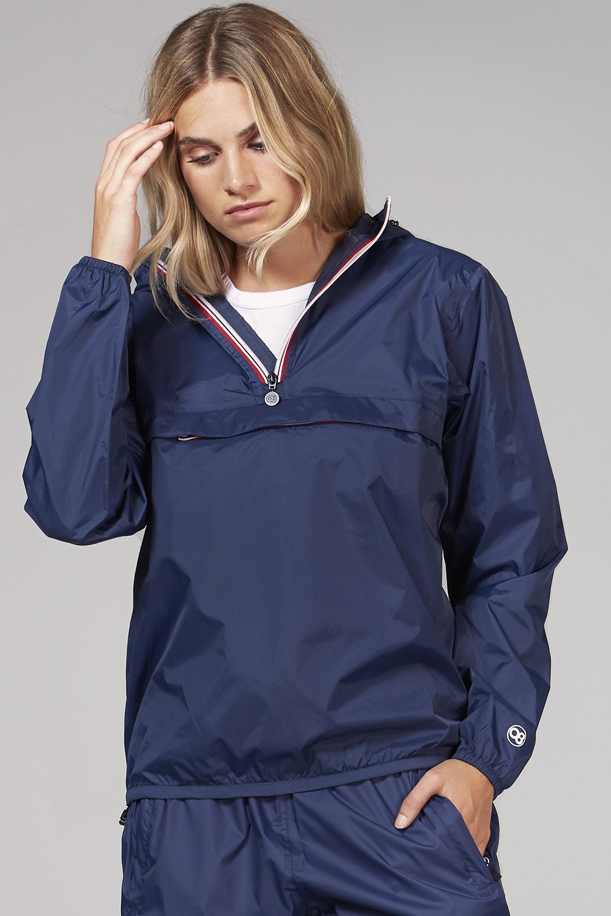 Picture of a Women's Quarter Zip Navy Blue Waterproof Rain Jacket front view