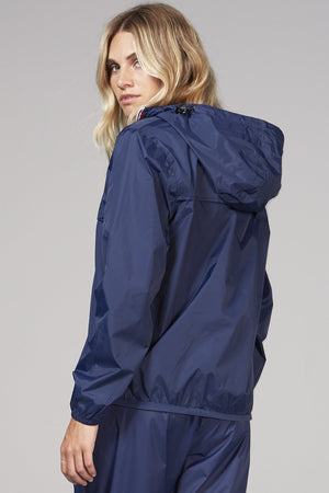 Picture of a Women's Quarter Zip Navy Blue Waterproof Rain Jacket side view