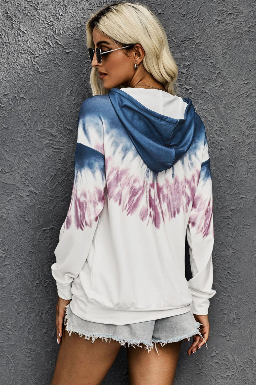 Picture of a Radiant Sunset Tie-Dye Hoodie in pink and blue back view