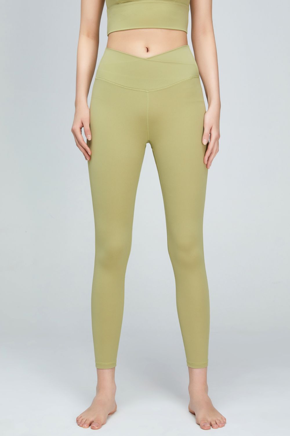 High Waisted Sports V Leggings green front view