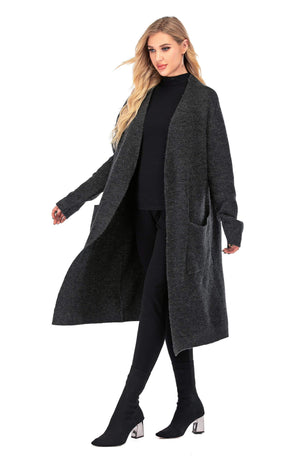 Picture of a Plain Women's Wool Open Front Cardigan with Pockets action shot walking from the side