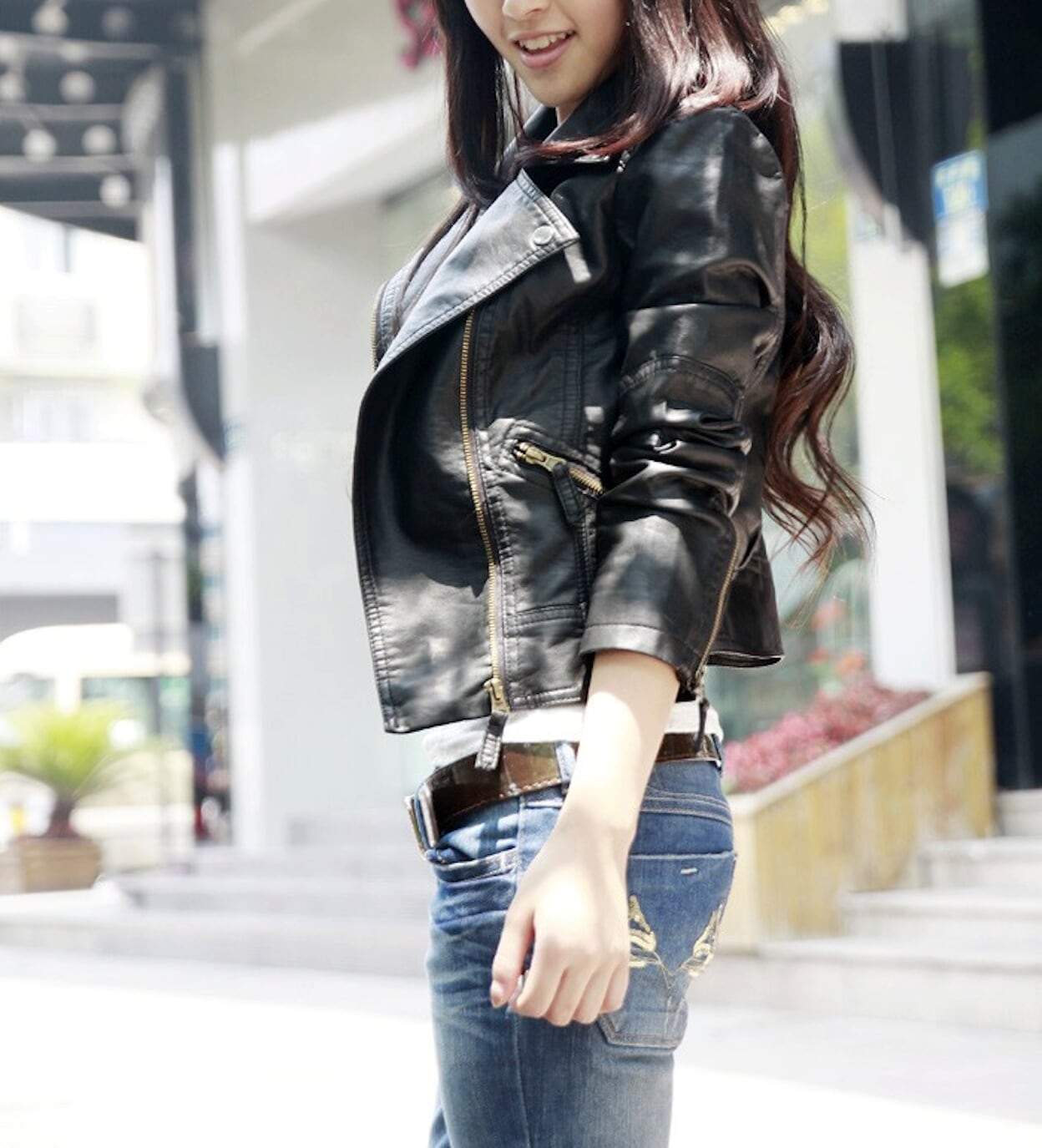 Picture of a Women's Black Cropped Vegan Leather Jacket side view 