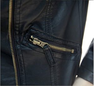 Picture of a Women's Black Cropped Vegan Leather Jacket close up of material and zipper